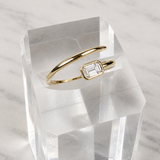 Bezel Spiral Emerald Cut Diamond Ring